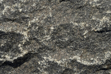 Surface of flat gray stone, rough natural background