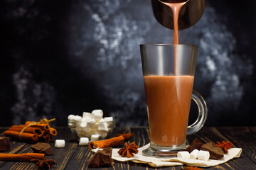 hot cocoa pouring in glass