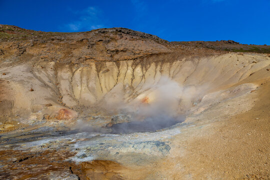 Geothermal area, hot steam, solfataras and hot mud cauldrons. Krisuvik, western Iceland.