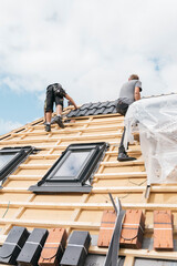 roofer building a roof