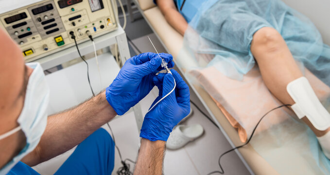 Cardiologist use tubes for radiofrequency catheter ablation.