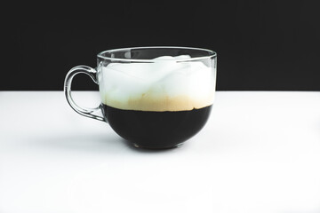 coffee in a glass on a black white background