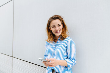 Young woman watching to the side with interest