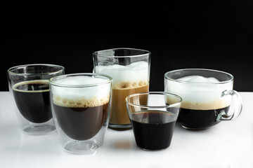 different types of coffee on a simple black white background