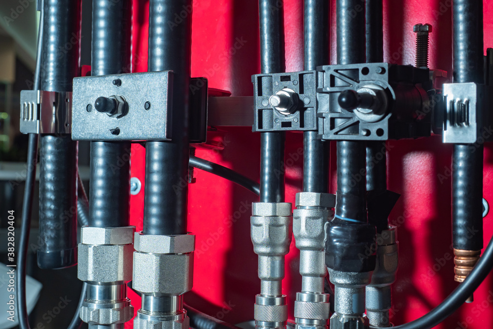 Aufkleber technical concept. the cables are fixed on the base. cables and adapters on a red background. indust