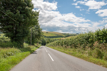 Fototapeta na wymiar Summertime road travels in the English countryside