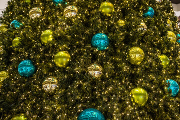 beautiful green Christmas tree colorful Hanging decoration balls closeup