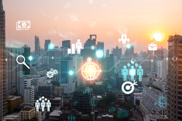 Hologram of Research and Development glowing icons. Sunset panoramic city view of Bangkok. Concept of innovative technologies to create new services and products in Asia. Double exposure.