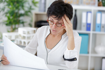 female architect getting stressed with a project