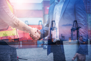 Double Exposure of Businessman and Container Shipping Worker Greeting Handshake Together With...