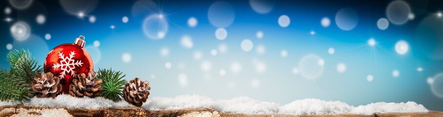 Christmas banner, ornaments on old wooden floor, bokeh lights background