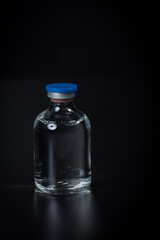 electrolyte solution in bottle, low key