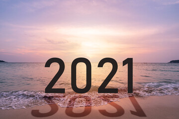 Beautiful sunset at tropical beach in summer with new year 2021 concept