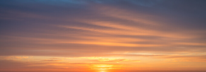 Naklejka na ściany i meble Dramatic orange sunrise sky in the morning