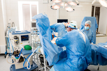 Surgery to remove the breast and replace it with an implant.