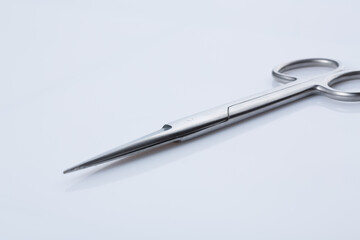 surgical scissor close up on white background