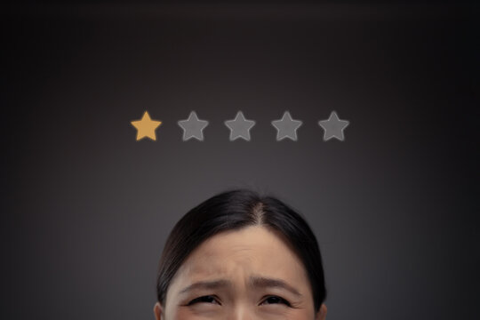 Sad Asian woman and star icon hologram effect.