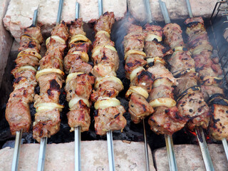 delicious juicy meat skewers cooked on charcoal.