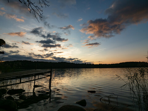 Sunset Hancza Lake, the deepest lake of Poland. © Beata
