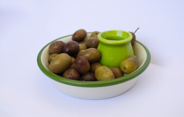 A platter with salted natural olives. Natural products