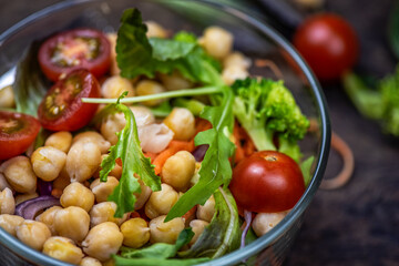  Close up healthy homemade chickpea and veggies salad, diet, vegetarian, vegan food, vitamin snack