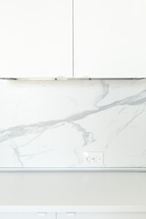 White empty contemporary kitchen front view. Minimalism trend
