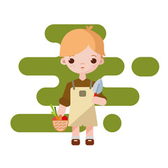 Farmer boy with vegetables in hand. Cute little gardener boy.