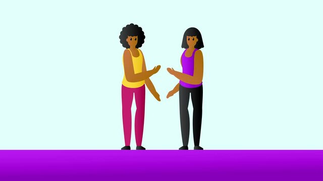 Two African woman greets each other with high five