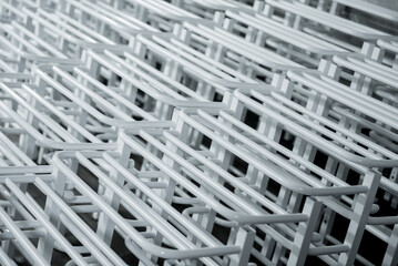 Abstract industrial background of metal pipes construction.