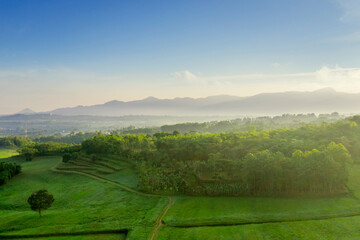 Beautiful tropical hills with misty mountain view