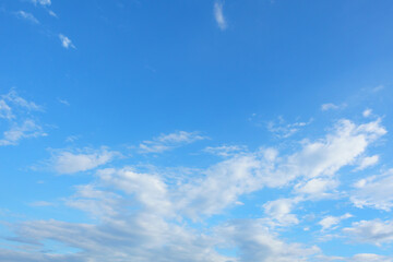 Naklejka na ściany i meble fantastic soft white clouds against blue sky