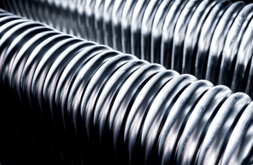 Abstract industrial background of metal pipes construction.