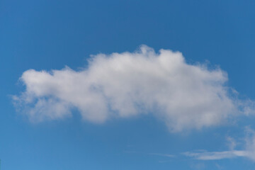 Fluffy white cloud formation in a beautiful blue sky