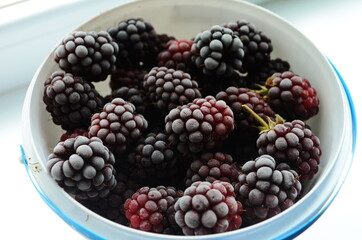 Healthy sweets concept frozen raspberries, blackberries