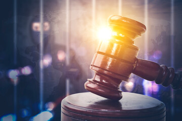 Double exposure of judge gavel with thief