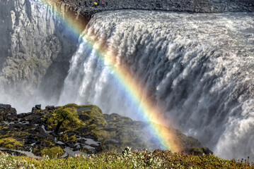 Dettifoss waterfall with late-afternoon rainbow