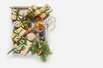 Christmas zero waste eco Care package,furoshiki gifts environmentally friendly gift wrapping craft paper fir branches, cozy winter winter evening Christmas Eve,ecological concept eco-friendly xmas