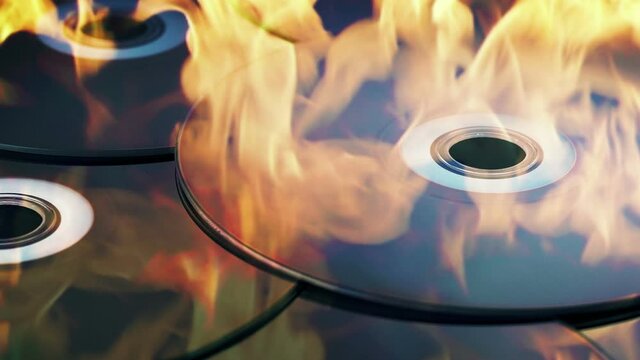 Blu Ray Discs In Flames - Burning Data Concept