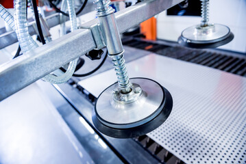 Suction cups equipment for transporting large sheets of metal