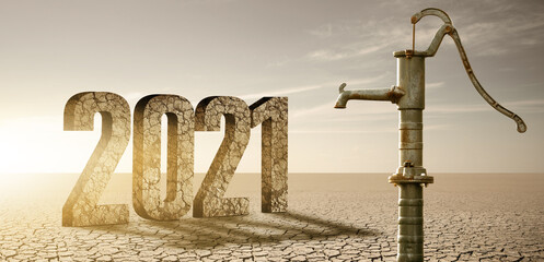 Dry cracked desert with rusty water pump and figures 2021. Drought and water scarcity caused by global warming	