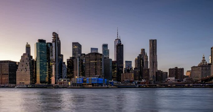Panning Day to Night Timelapse Sunset Over East River West Lower Manhattan Skyline