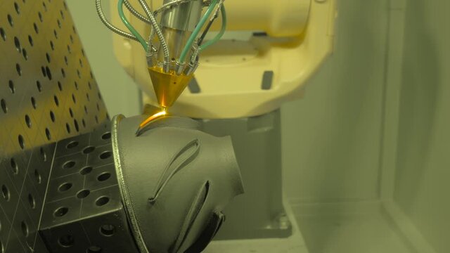 Direct metal deposition - advanced additive laser melting and powder spray manufacturing technology for repair, rebuild metal workpieces. Metalworking, robotic, industrial concept