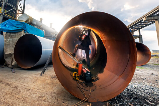 Shielded metal arc welding  process. It is also known as manual metal arc welding or stick welding. Electric current is used to strike an arc between the base material and consumable electrode rod.