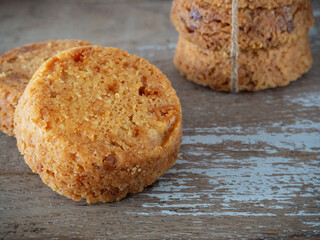 Homemade almond cookies on rustic background