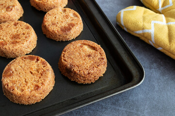 Homemade almond cookies on rustic background