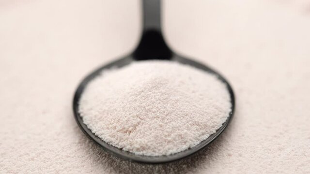 collagen powder in spoon close up