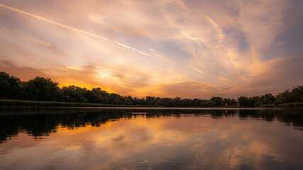 Autumn sunset on Lake Krugloye. The natural park 
