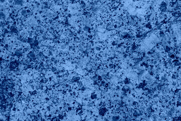 Fototapeta na wymiar Blue Granite rock closeup background, stone texture, cracked surface.