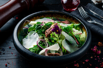 fresh salad with beef and cheese