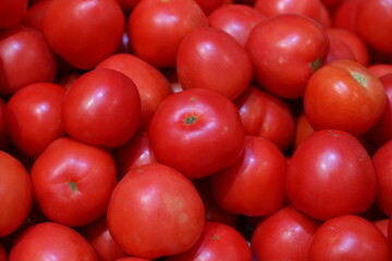 Fresh tomatoes on the counter in the store. Farmers fair